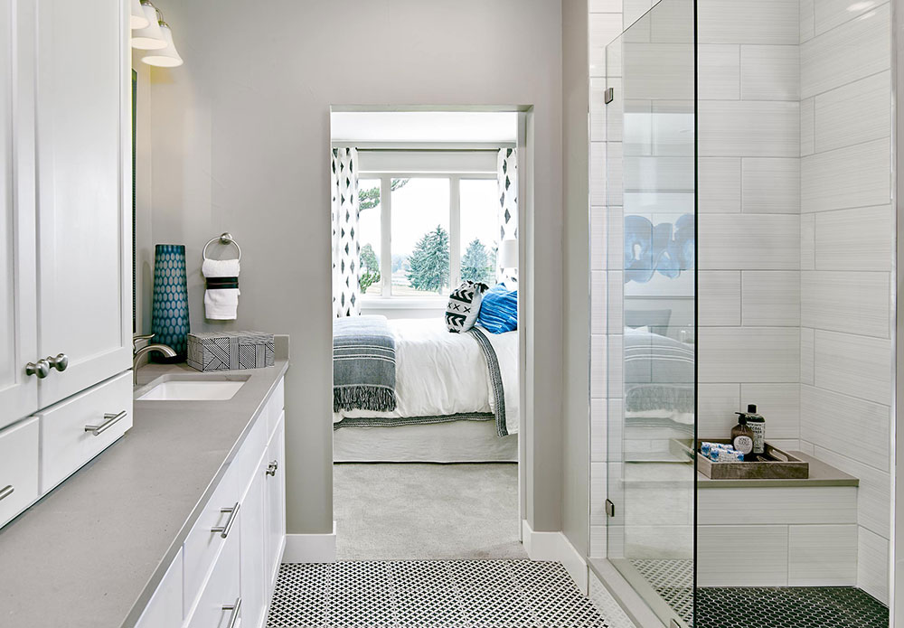 Replacing the tub with a luxe shower is a good design compromise to save space in urban infill architecture