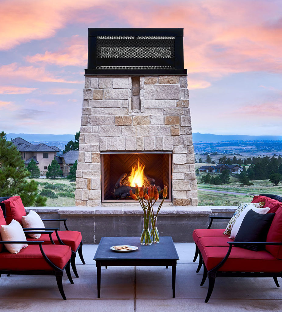 Luxury outdoor living space with built in fireplace